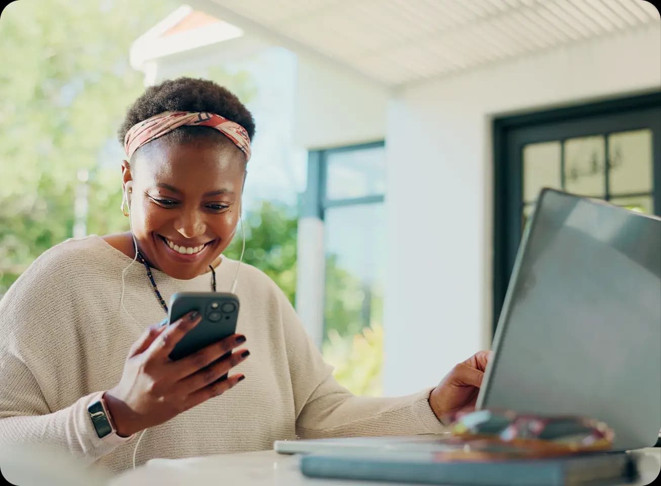Woman smiling at phone