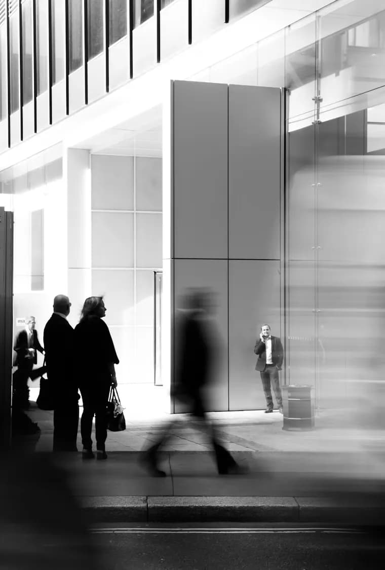 Shoppers walking through a city shopping district